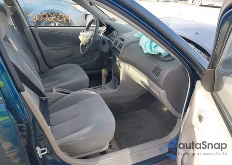 2001 Toyota Corolla Ce from USA, damaged, VIN 2T1BR12E11C499752